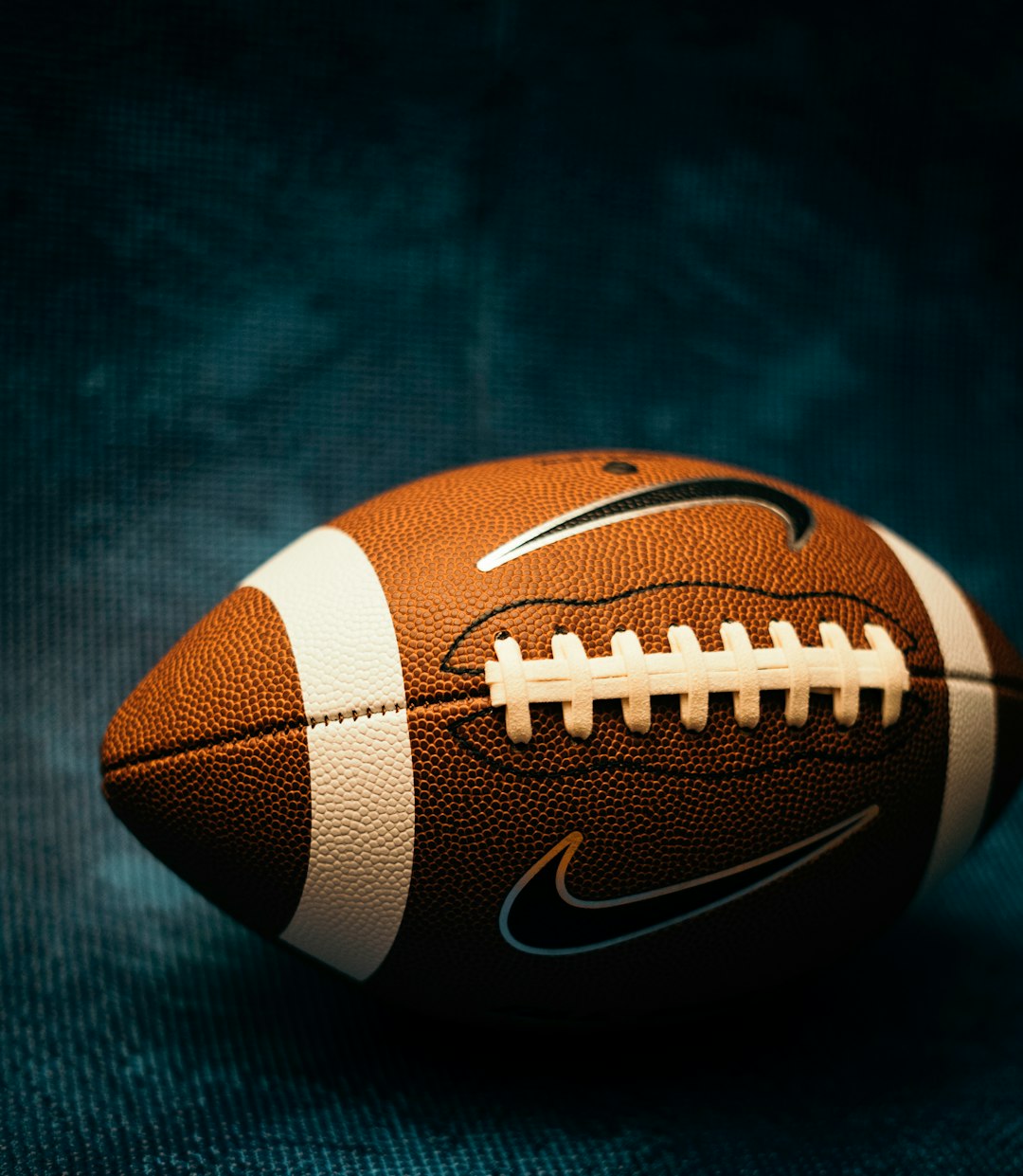American Football ball with light and shadow
